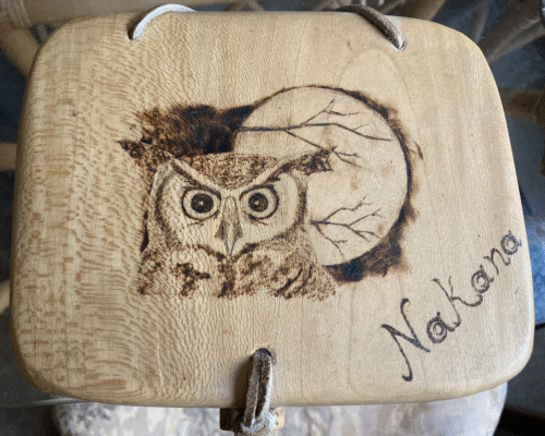 Wooden box with image of an owl burned on the lid.