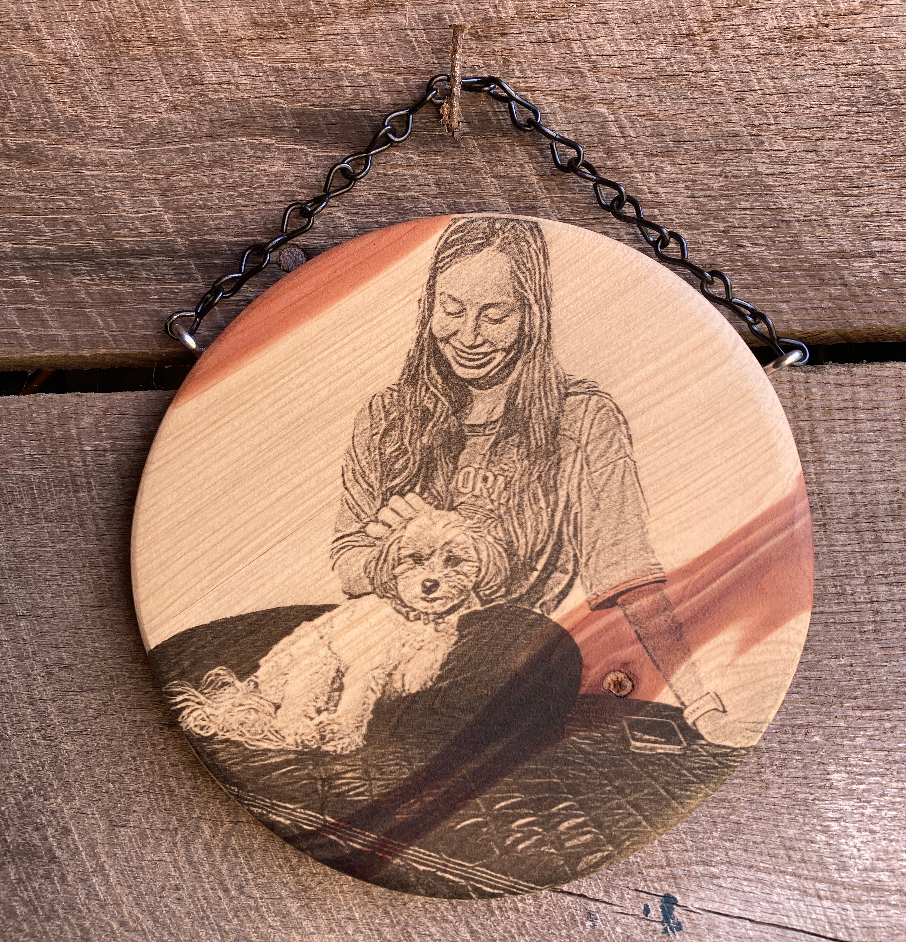 Wood printed image of a girl and her dog