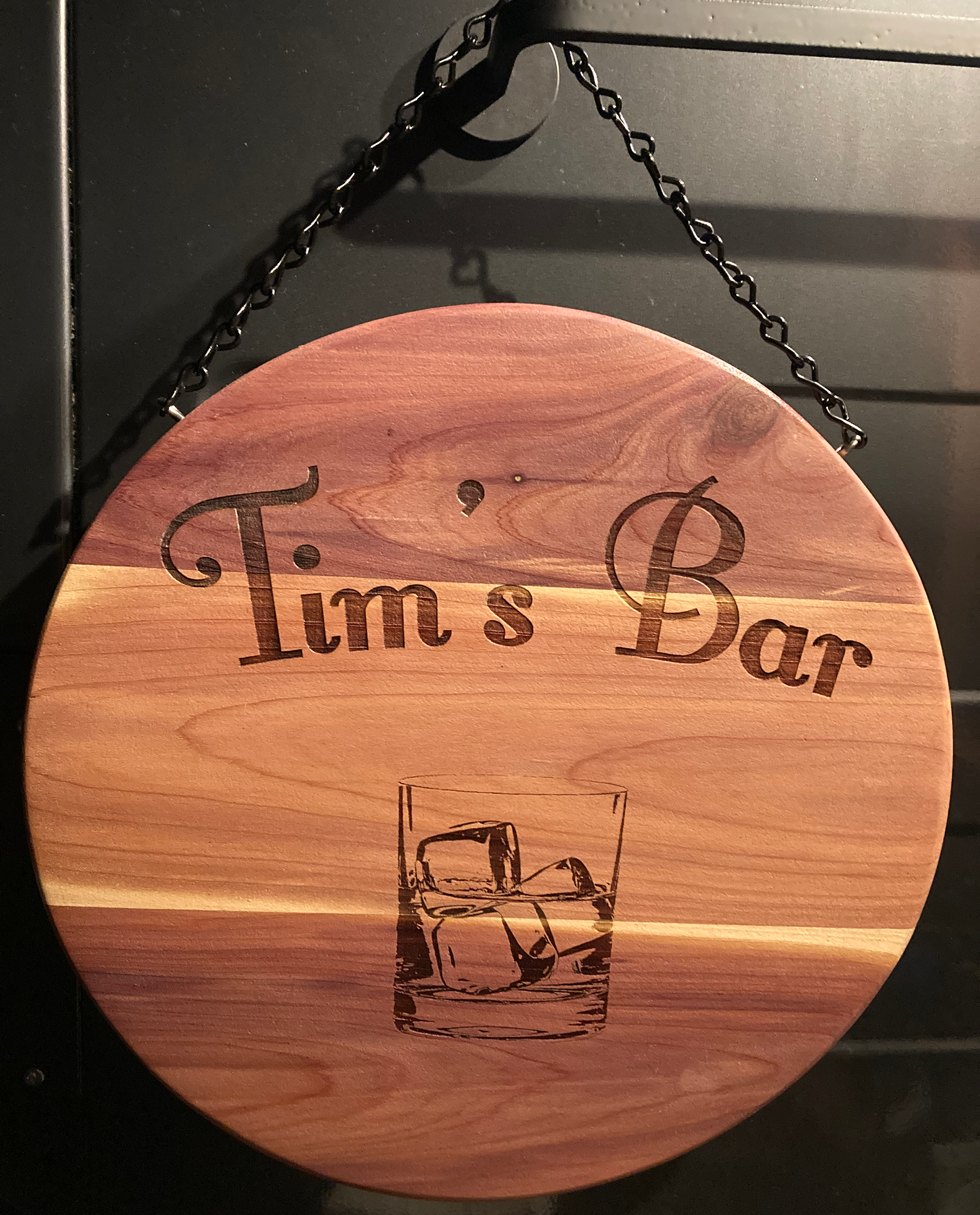 "Tim's Bar" Sign on cedar